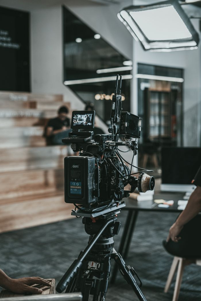 A professional film camera setup on a modern indoor set. Perfect for film and media projects.